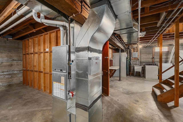 basement featuring sink and separate washer and dryer