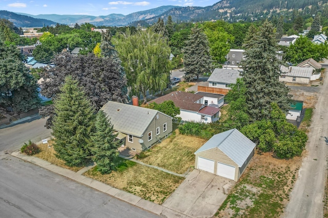 birds eye view of property featuring a mountain view