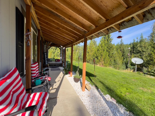 view of patio with a view of trees