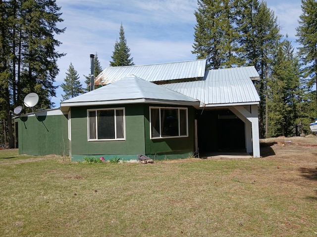 4224 Grouse Creek Rd Unit C, Loon Lake, WA 99148 - view of front of house featuring a front yard and metal roof