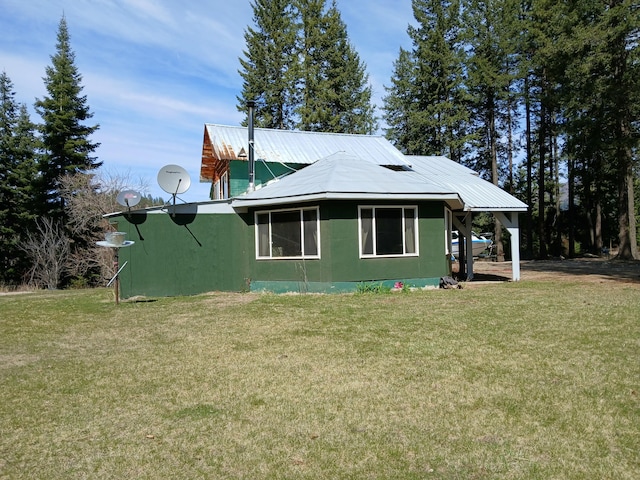 4224 Grouse Creek Rd Unit C, Loon Lake, WA 99148 - view of property exterior with a lawn