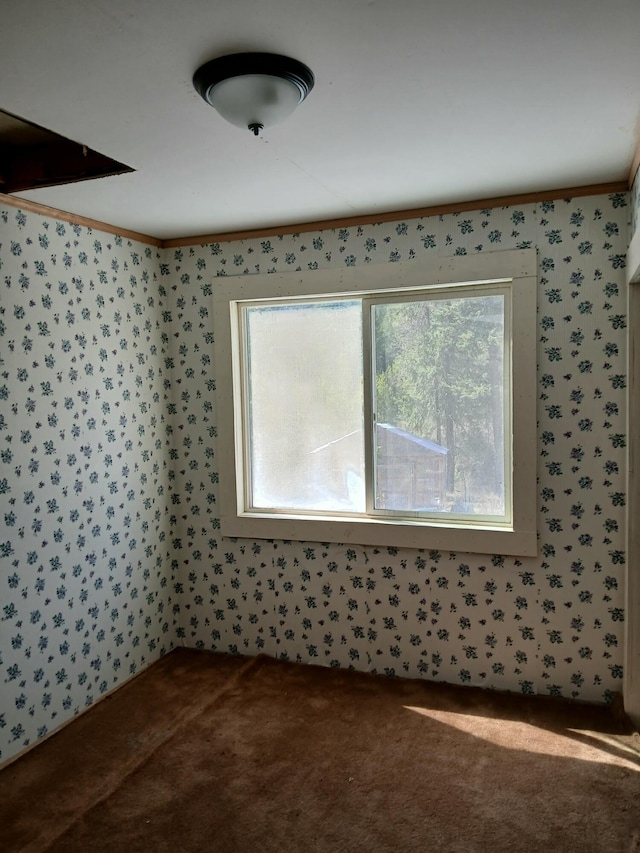 4224 Grouse Creek Rd Unit C, Loon Lake, WA 99148 - empty room with a healthy amount of sunlight, carpet flooring, and wallpapered walls