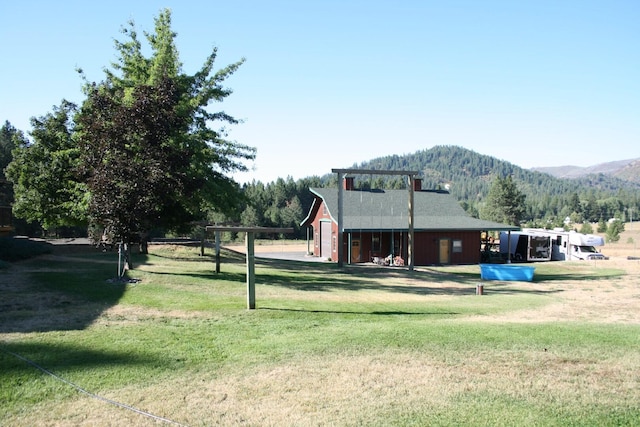 4738 Price Rd, Clayton, WA 99110 - view of property's community with a lawn and a mountain view