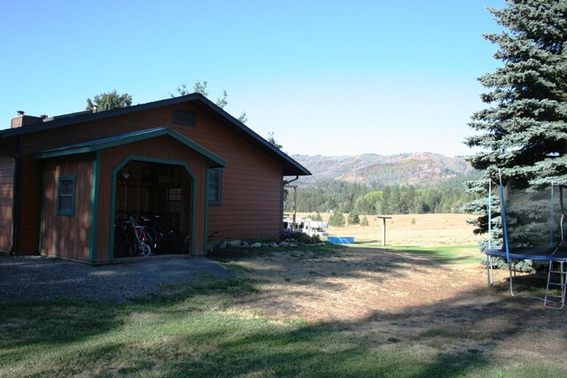 4738 Price Rd, Clayton, WA 99110 - view of outbuilding with a trampoline and a mountain view