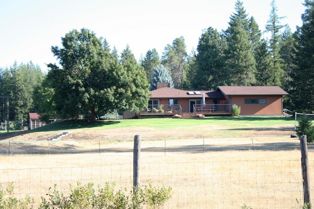 4738 Price Rd, Clayton, WA 99110 - ranch-style home featuring a wooden deck and a front yard