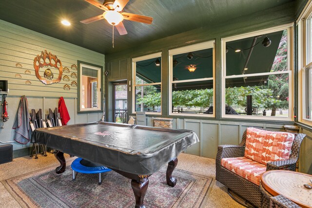 420 Palmer Ln, Chewelah, WA 99109 - recreation room with billiards, ceiling fan, carpet flooring, and wood walls