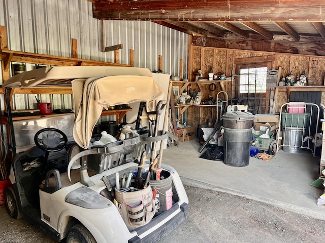 717 Conrad Hill Way, Colville, WA 99114 - garage featuring wood walls