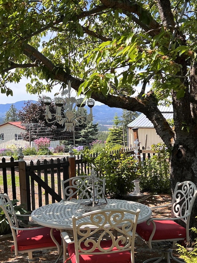 717 Conrad Hill Way, Colville, WA 99114 - wooden deck with a mountain view