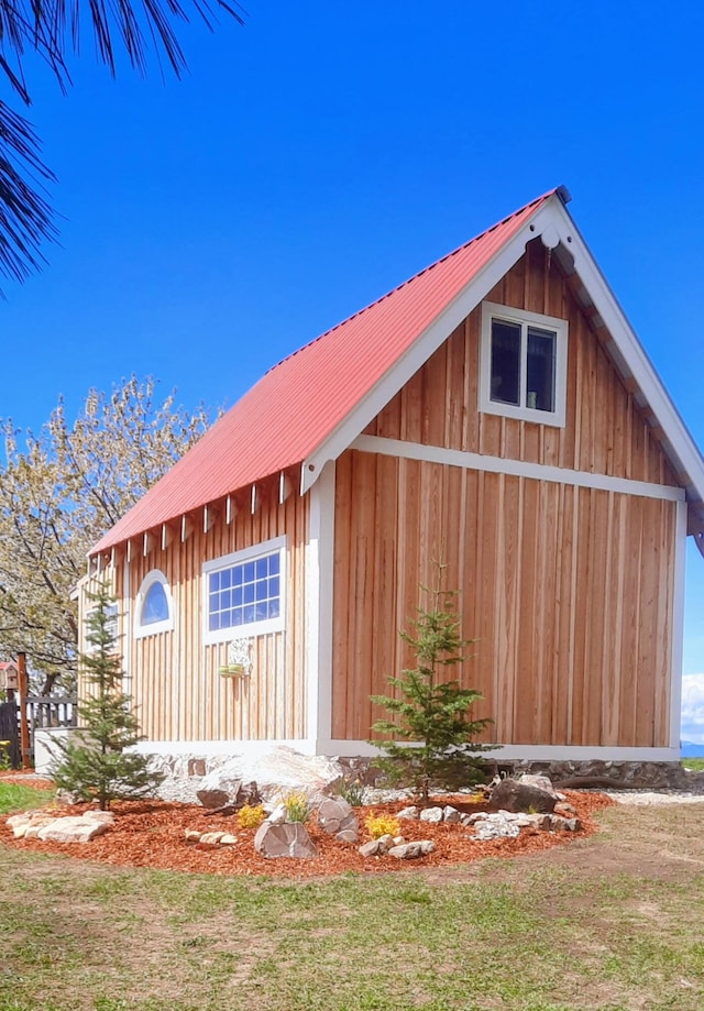 717 Conrad Hill Way, Colville, WA 99114 - view of home's exterior with board and batten siding and a metal roof