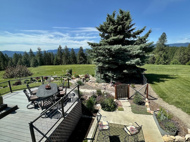 717 Conrad Hill Way, Colville, WA 99114 - deck with a lawn, a forest view, a mountain view, and outdoor dining space