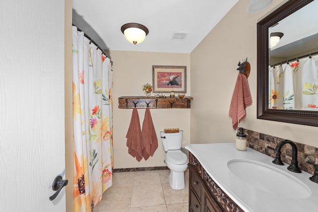 full bath featuring visible vents, tile patterned flooring, vanity, baseboards, and toilet