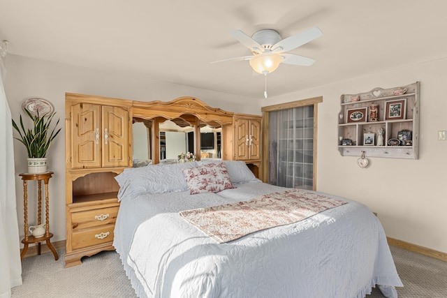 717 Conrad Hill Way, Colville, WA 99114 - bedroom with light colored carpet, baseboards, and a ceiling fan