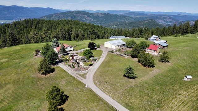 717 Conrad Hill Way, Colville, WA 99114 - drone / aerial view of a mountain backdrop and a heavily wooded area