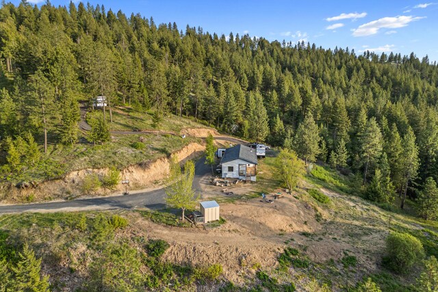 bird's eye view featuring a view of trees