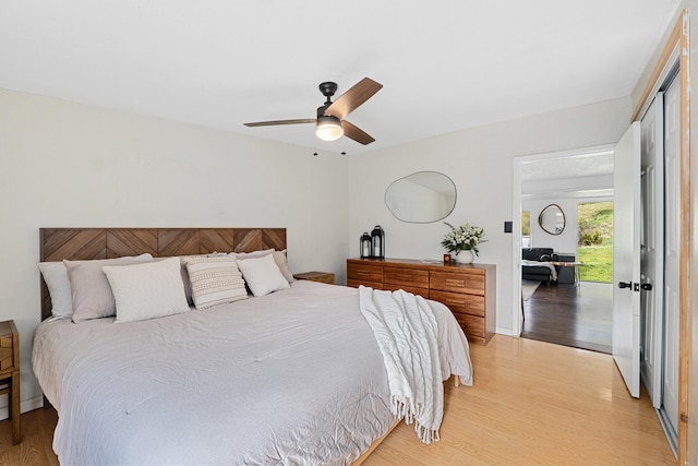 1625 Bear Mountain Way, Kettle Falls, WA 99141 - bedroom featuring a closet, ceiling fan, and light wood-style floors