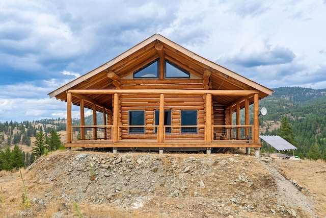 view of home's exterior featuring a mountain view