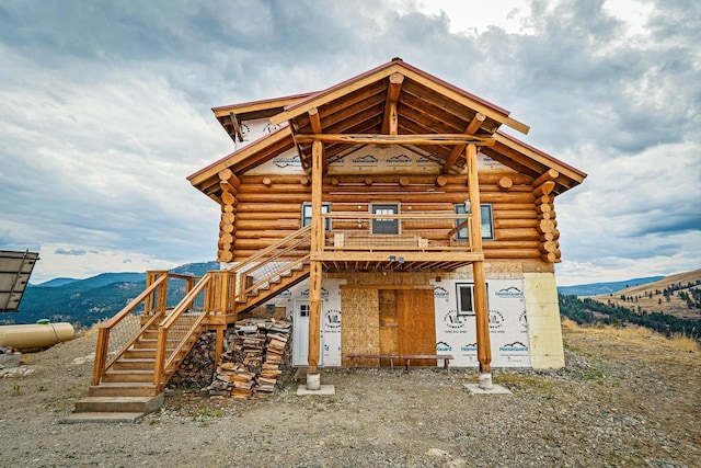 exterior space featuring a mountain view