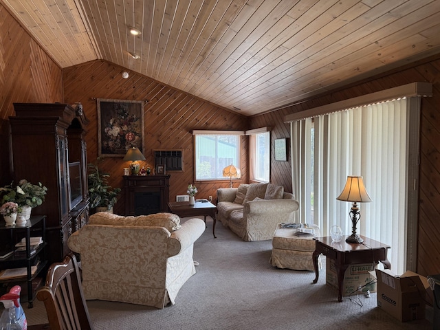 11 Crestview Dr, Kettle Falls, WA 99141 - carpeted living room with lofted ceiling, wooden walls, and wood ceiling