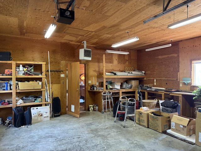 11 Crestview Dr, Kettle Falls, WA 99141 - garage with a garage door opener and a workshop area