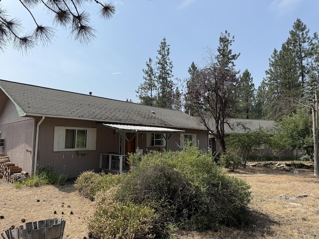 11 Crestview Dr, Kettle Falls, WA 99141 - rear view of house with a shingled roof