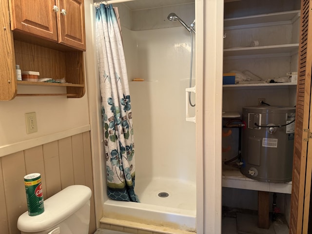 11 Crestview Dr, Kettle Falls, WA 99141 - full bath featuring a stall shower, electric water heater, and a wainscoted wall