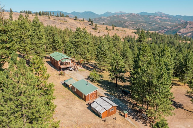 drone / aerial view featuring a mountain view