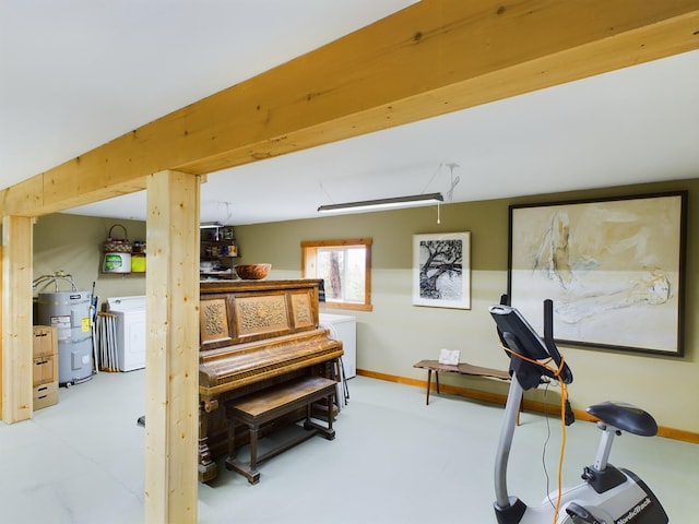 workout room with washer / dryer and water heater