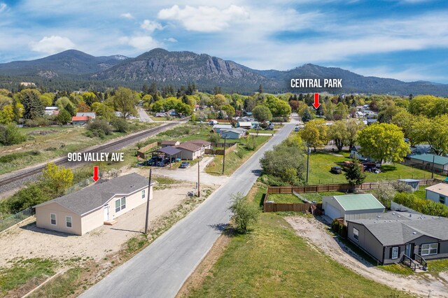 906 Valley Ave, Chewelah, WA 99109 - bird's eye view with a mountain view and a residential view