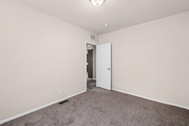 906 Valley Ave, Chewelah, WA 99109 - carpeted spare room with visible vents and baseboards
