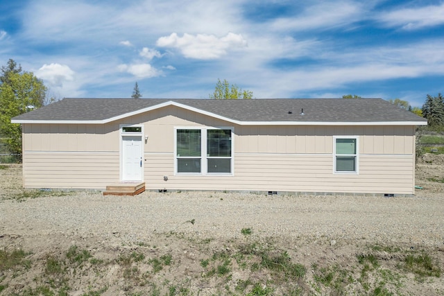 906 Valley Ave, Chewelah, WA 99109 - back of property featuring a shingled roof and crawl space
