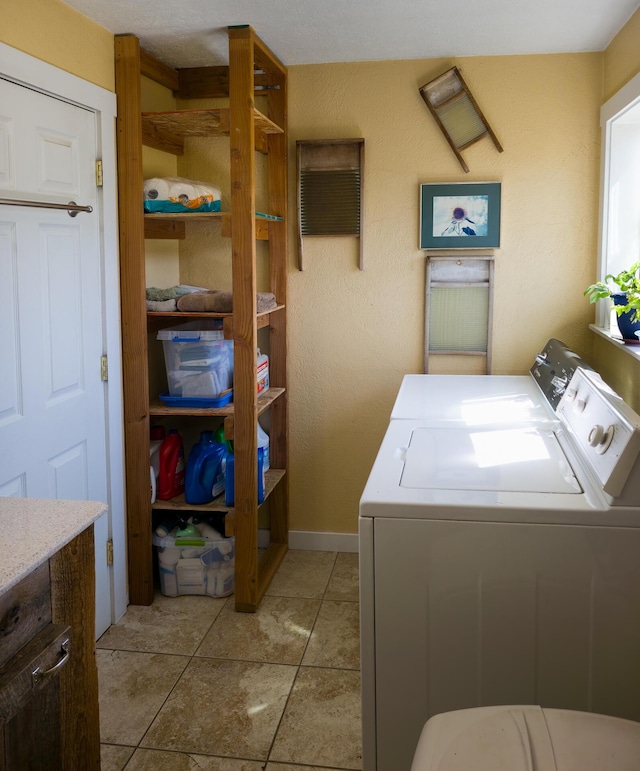 1239 Kewa Meteor Rd, Inchelium, WA 99138 - laundry area featuring washer and dryer and baseboards