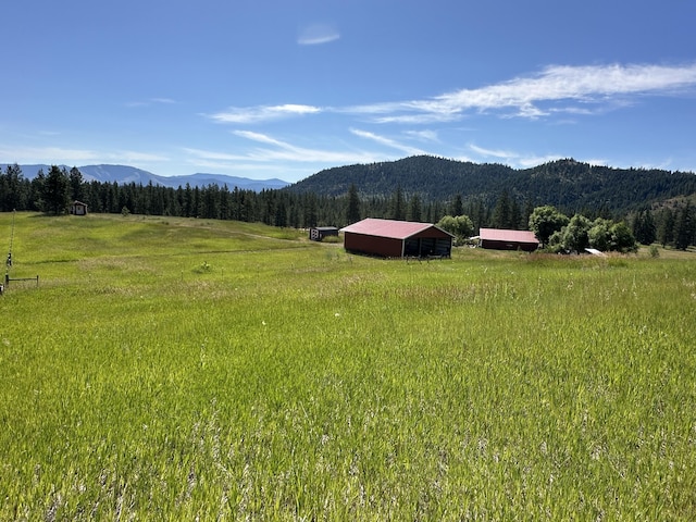 1239 Kewa Meteor Rd, Inchelium, WA 99138 - mountain view featuring rural landscape and a heavily wooded area