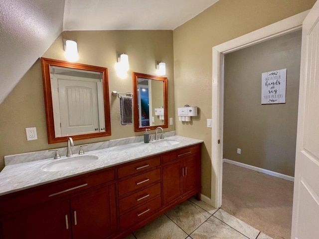 bathroom with vanity and tile patterned floors