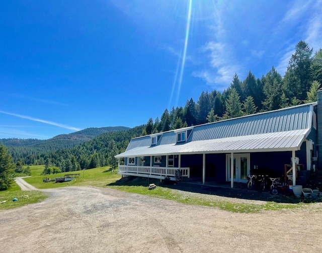 view of front of home featuring a mountain view