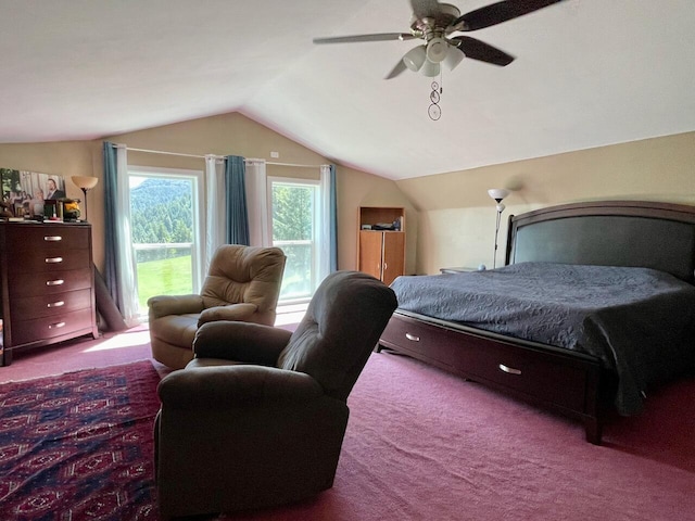 bedroom with ceiling fan, carpet floors, and lofted ceiling