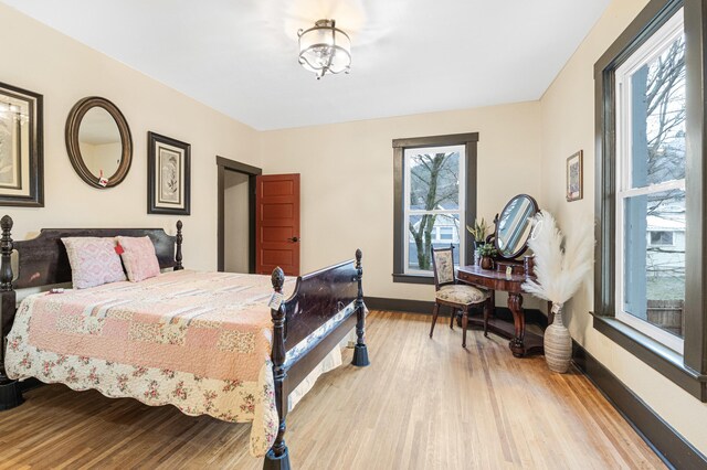 bedroom with light wood-type flooring