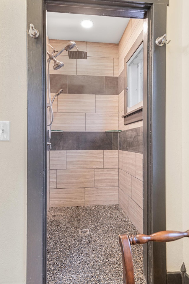 bathroom featuring tiled shower