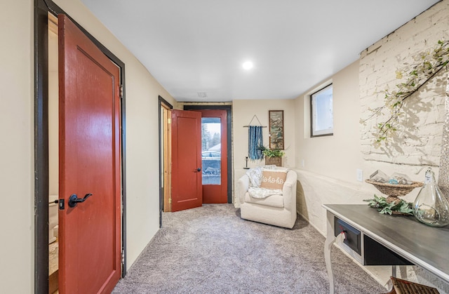 sitting room with light carpet