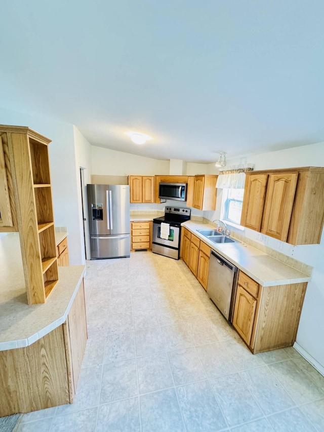 211 8th Ave, Ione, WA 99139 - kitchen featuring appliances with stainless steel finishes, a sink, light countertops, and light brown cabinets