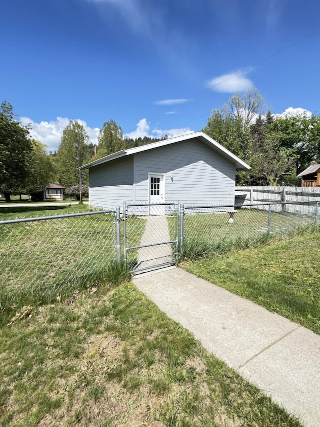 211 8th Ave, Ione, WA 99139 - view of home's exterior with a gate