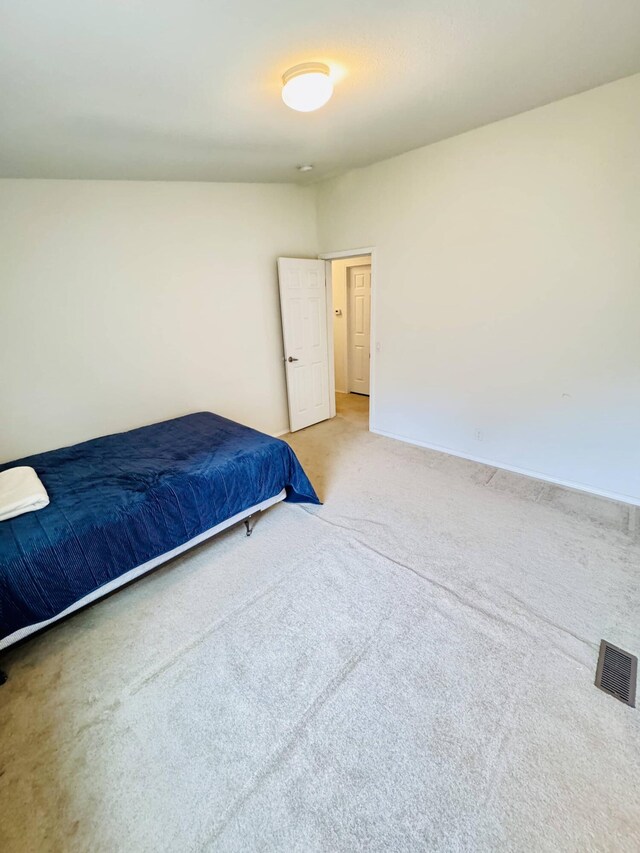 211 8th Ave, Ione, WA 99139 - bedroom with carpet flooring and baseboards