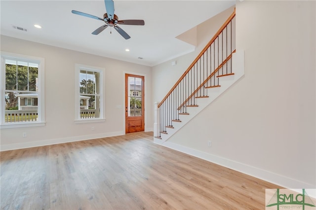 49 Salt Marsh Dr, Midway, GA 31320 - entryway featuring ceiling fan and light wood-type flooring