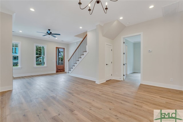 49 Salt Marsh Dr, Midway, GA 31320 - spare room with ceiling fan with notable chandelier and light hardwood / wood-style flooring