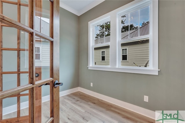 49 Salt Marsh Dr, Midway, GA 31320 - unfurnished room with french doors, light hardwood / wood-style flooring, and ornamental molding