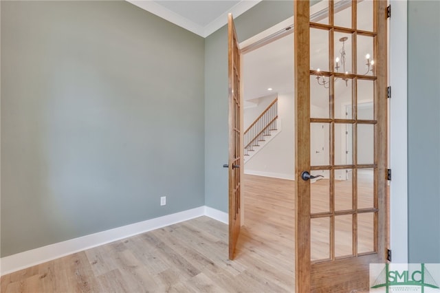 49 Salt Marsh Dr, Midway, GA 31320 - unfurnished room featuring light hardwood / wood-style floors and ornamental molding