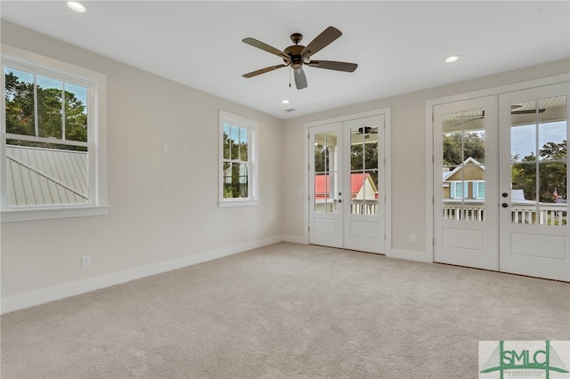 49 Salt Marsh Dr, Midway, GA 31320 - interior space with light carpet, ceiling fan, and french doors