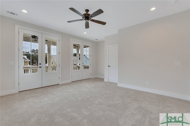 49 Salt Marsh Dr, Midway, GA 31320 - unfurnished bedroom with french doors, light carpet, access to outside, and ceiling fan