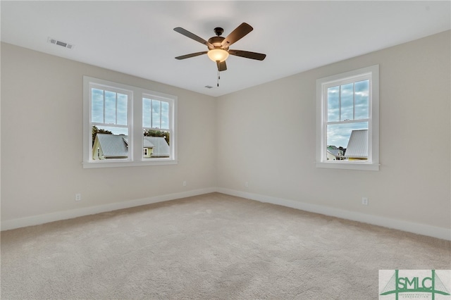 49 Salt Marsh Dr, Midway, GA 31320 - carpeted empty room with ceiling fan and a healthy amount of sunlight