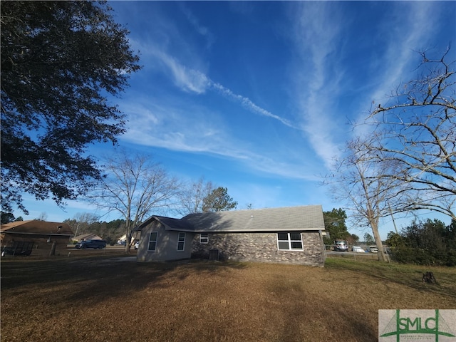 exterior space with a front lawn