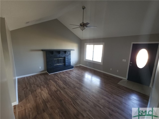 unfurnished living room with vaulted ceiling, ceiling fan, and dark hardwood / wood-style floors